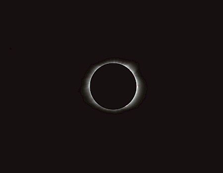 A dark background with a bright ring around a nearly black circle, resembling a solar eclipse silhouette, centered and minimalist.